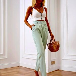 Never worn, mint green pants with belt